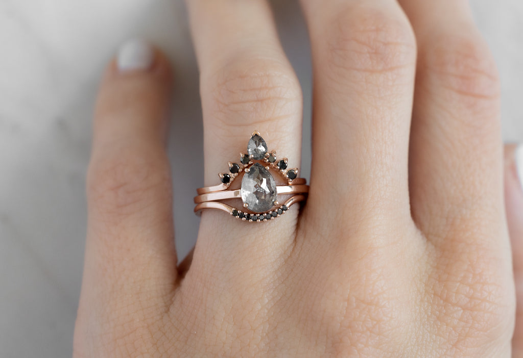 The Bryn Ring with a Rose-Cut Salt and Pepper Diamond with Stacking Bands on Model