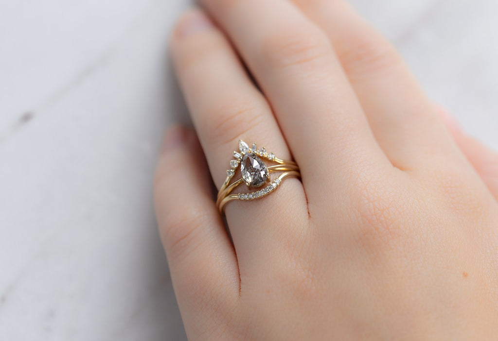 The Bryn Ring with a Rose-Cut Salt and Pepper Diamond with Stacking Bands on Model