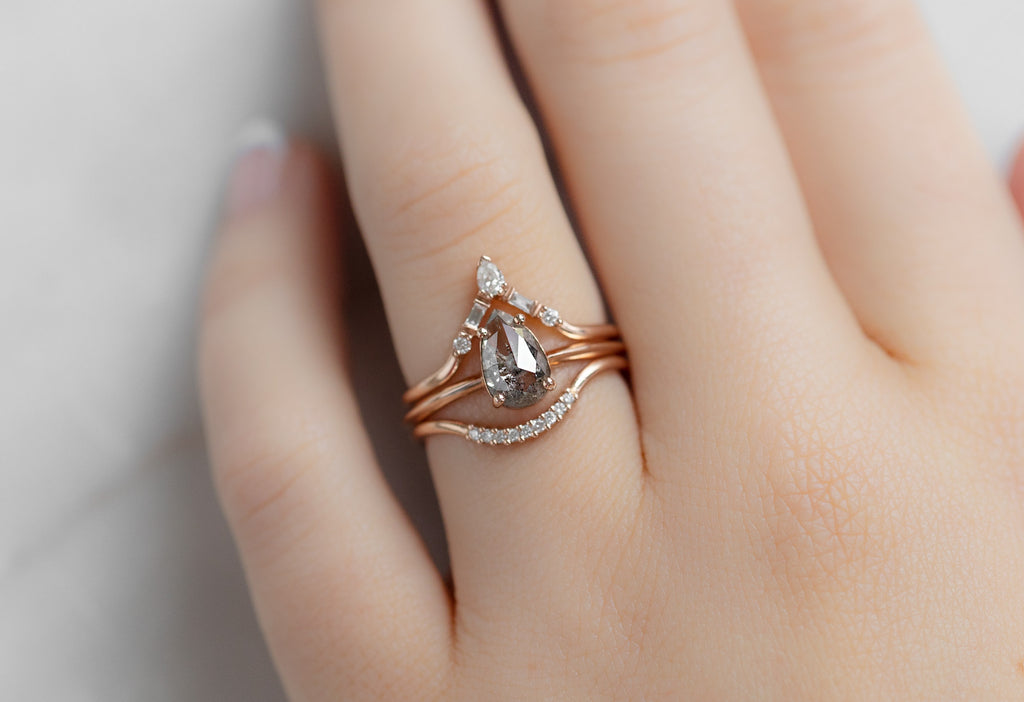 The Bryn Ring with a Rose-Cut Salt and Pepper Diamond with White Diamond Stacking Bands on Model