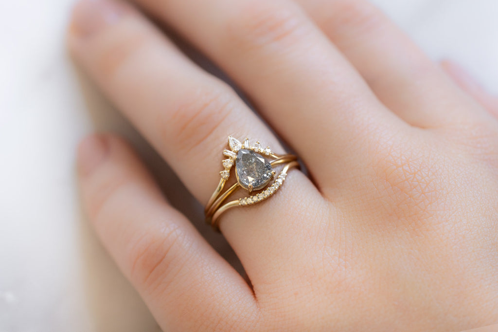 The Bryn Ring with a Salt and Pepper Diamond with White Diamond Stacking Bands on Model