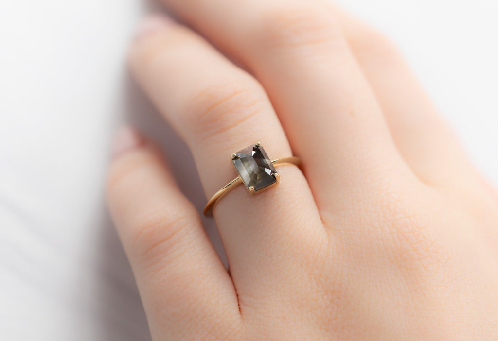 The Bryn Ring with an Emerald-Cut Black Diamond on Model