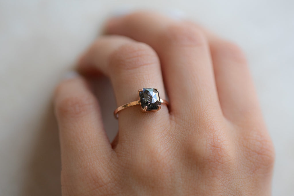 The Bryn Ring with an Emerald-Cut Black Diamond On Model