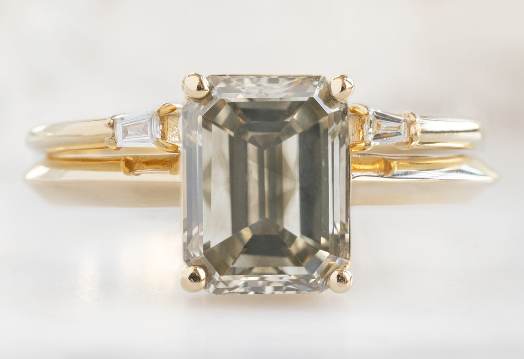 The Bryn Ring with an Emerald-Cut Grey Diamond with Open Cuff Baguette Stacking Band