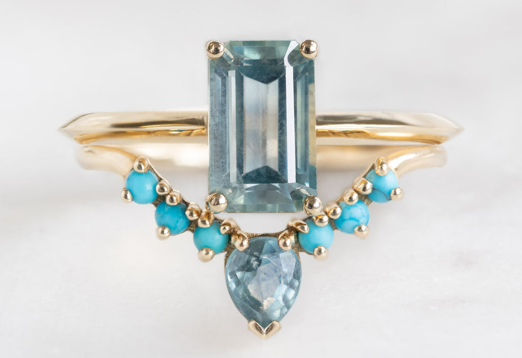 The Bryn Ring with an Emerald-Cut Montana Sapphire with Montana Sapphire Turquoise Sunburst