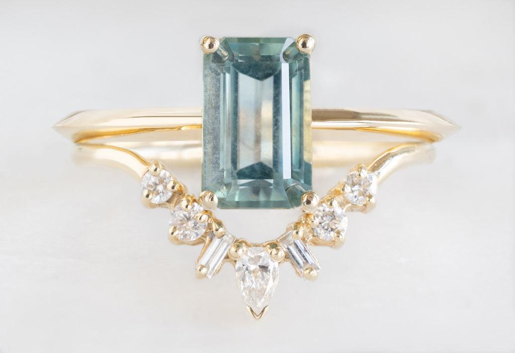 The Bryn Ring with an Emerald-Cut Montana Sapphire with White Diamond Geometric Sunburst