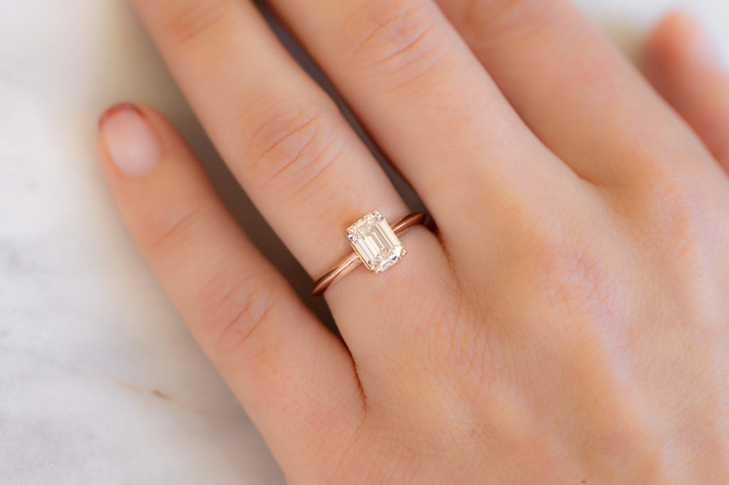 The Bryn Ring with an Emerald-Cut Pink Diamond on Model