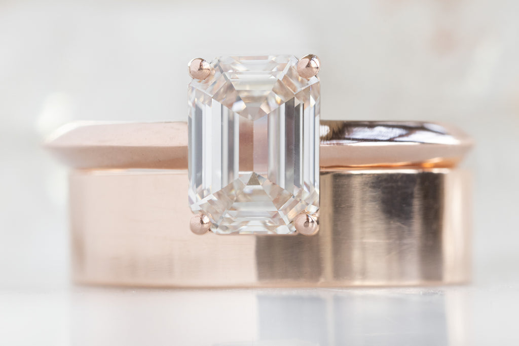 The Bryn Ring with an Emerald-Cut Pink Diamond with Stacking Band
