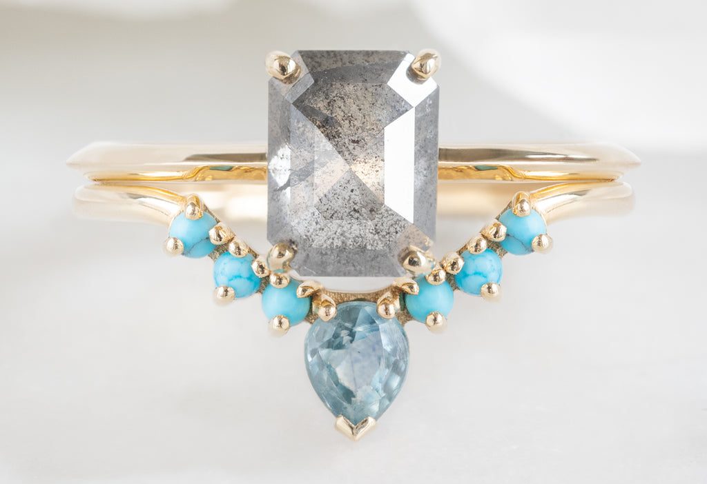 The Bryn Ring with an Emerald-Cut Salt and Pepper Diamond with Turquoise and Sapphire Sunburst Stacking Band