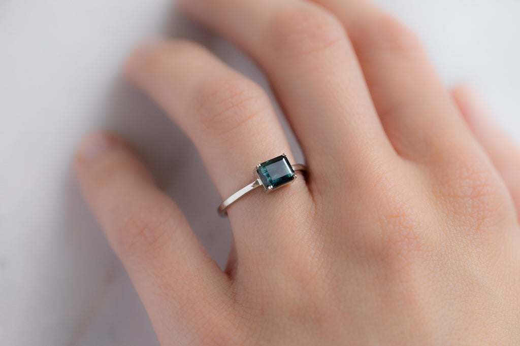 The Bryn Ring with an Emerald-Cut Sapphire on Model