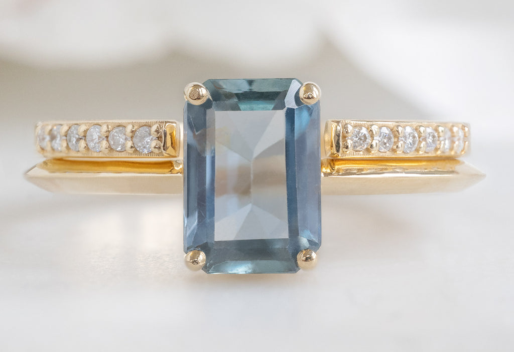 The Bryn Ring with an Emerald-Cut Sapphire with Open Cuff Pavé Stacking Band