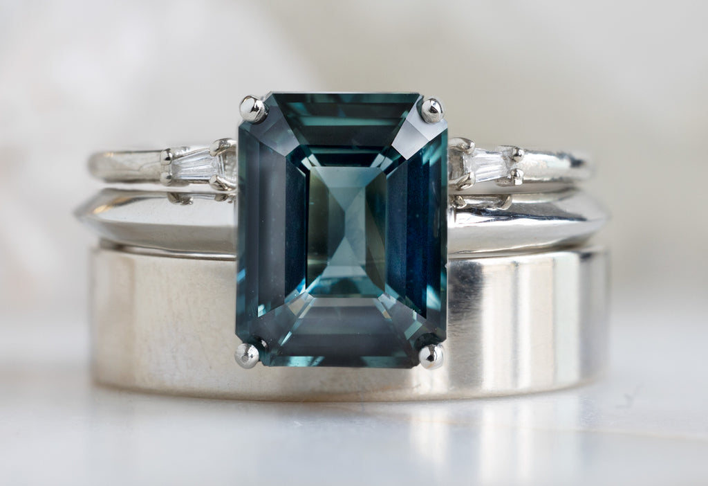 The Bryn Ring with an Emerald Cut Sapphire with Stacking Band