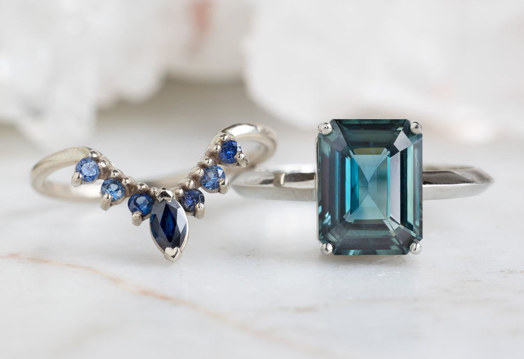 The Bryn Ring with an Emerald Cut Sapphire with Stacking Band