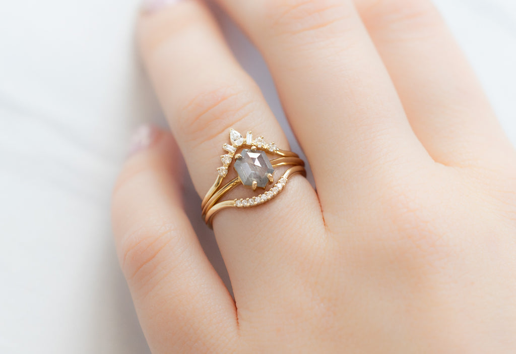 The Bryn Ring with an Opalescent Grey Hexagon Diamond with STacking Bands on Model