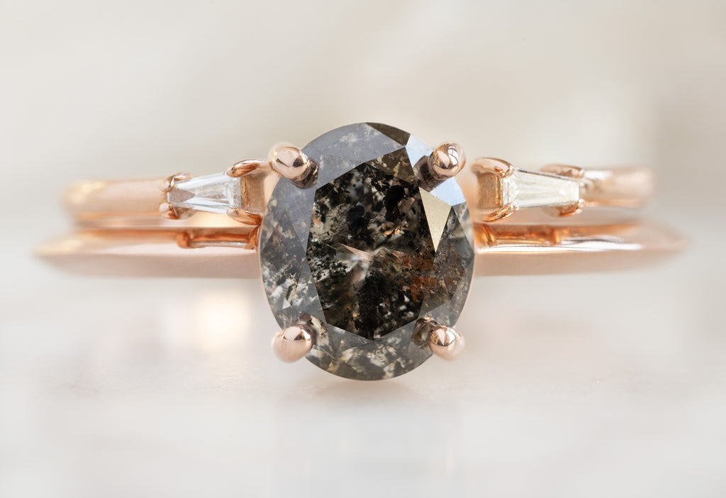 The Bryn Ring with an Oval-Cut Black Diamond with Open Cuff Baguette Stacking Band