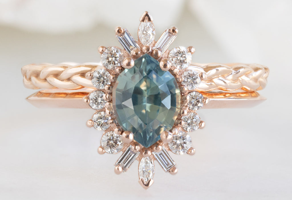 The Camellia Ring with a Bicolor Marquise Sapphire with Braided Stacking Band