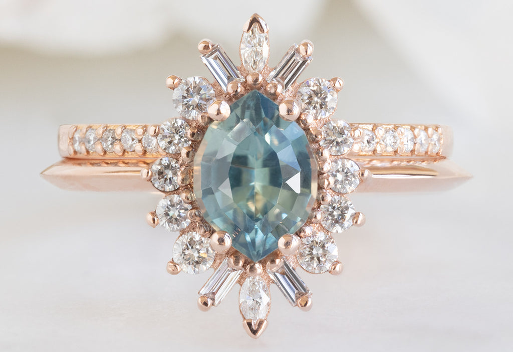 The Camellia Ring with a Bicolor Marquise Sapphire with Open Cuff Pavé Stacking Band