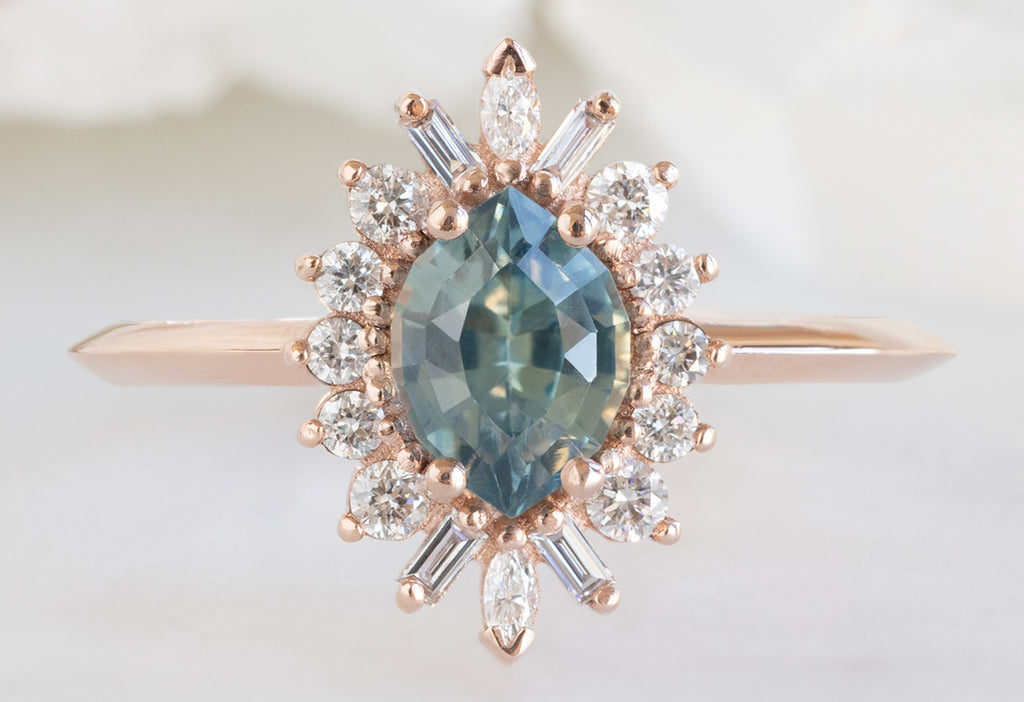 The Camellia Ring with a Bicolor Marquise Sapphire