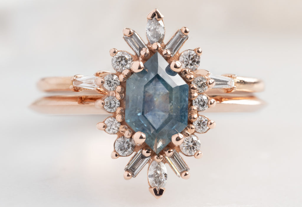 The Camellia Ring with a Montana Sapphire Hexagon with Open Cuff Baguette Stacking Band