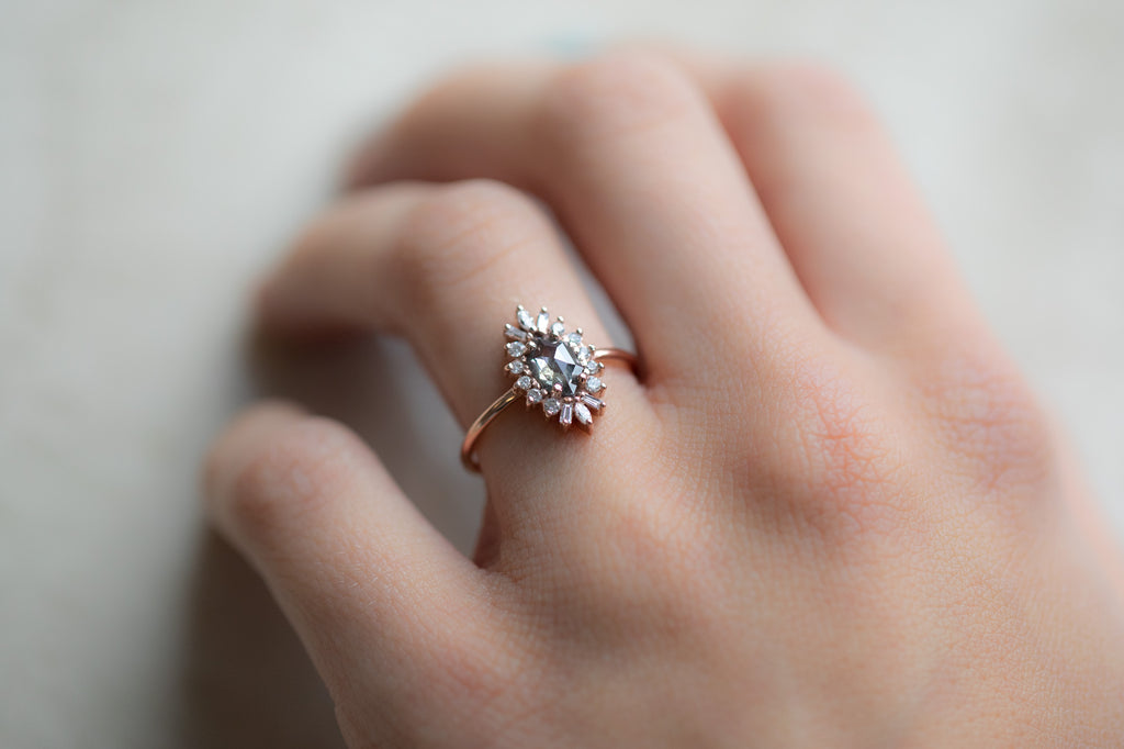 The Camellia Ring with a Salt and Pepper Hexagon Diamond on model