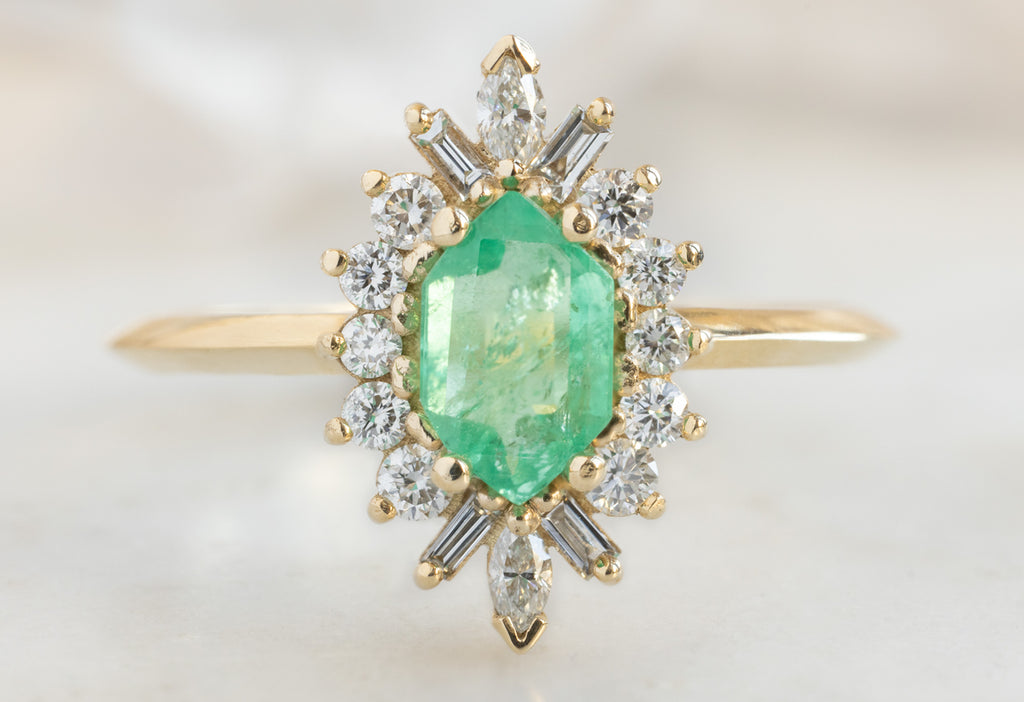 The Camellia Ring with an Emerald Hexagon