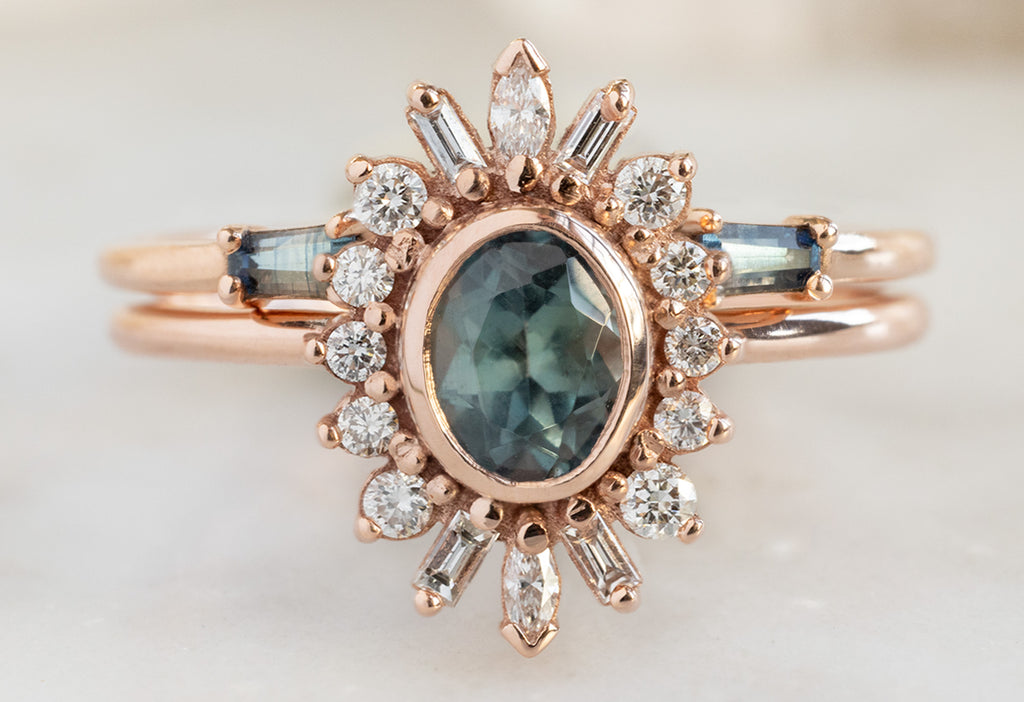 The Camellia Ring with an Oval-Cut Montana Sapphire with Open Cuff Montana Sapphire Baguette Stacking Band