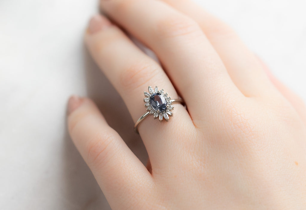 The Camellia Ring with an Oval-Cut Spinel on Model