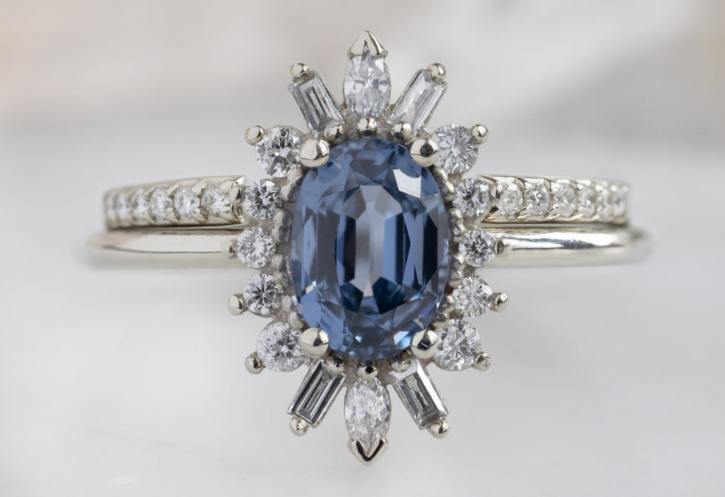 The Camellia Ring with an Oval-Cut Spinel with Open Cuff Pavé Stacking Band