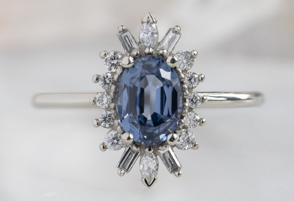 The Camellia Ring with an Oval-Cut Spinel