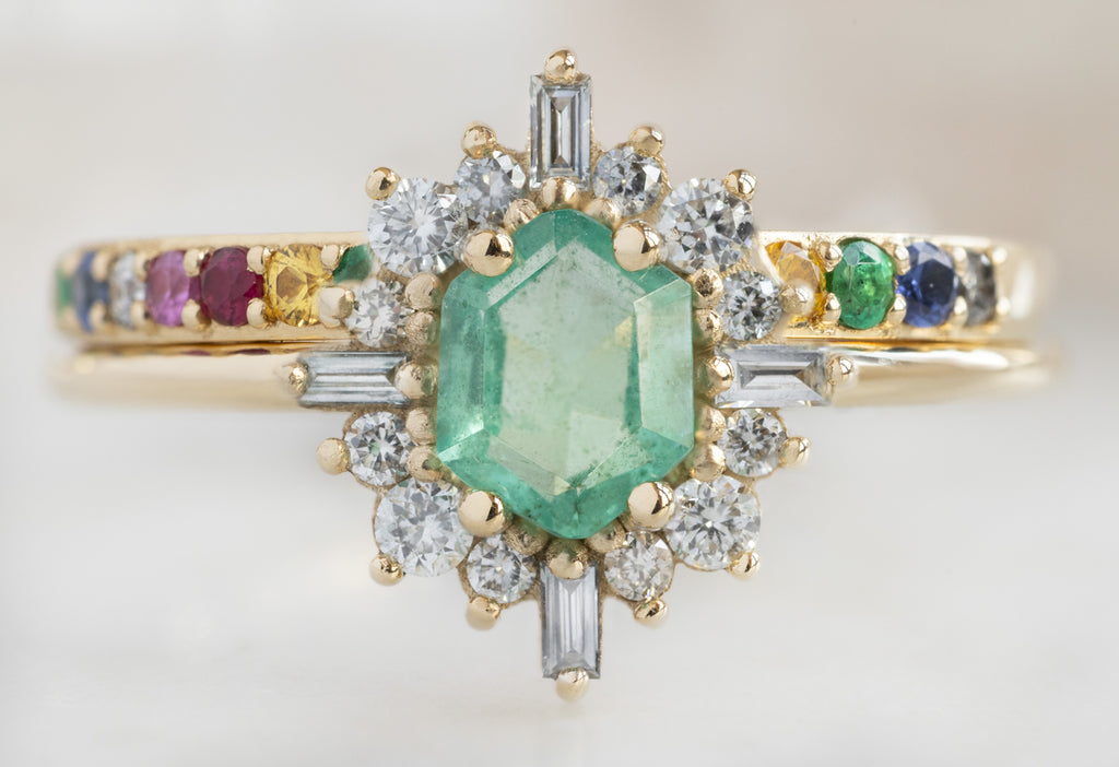The Compass Ring with an Emerald Hexagon with Rainbow Sapphire Stacking Band