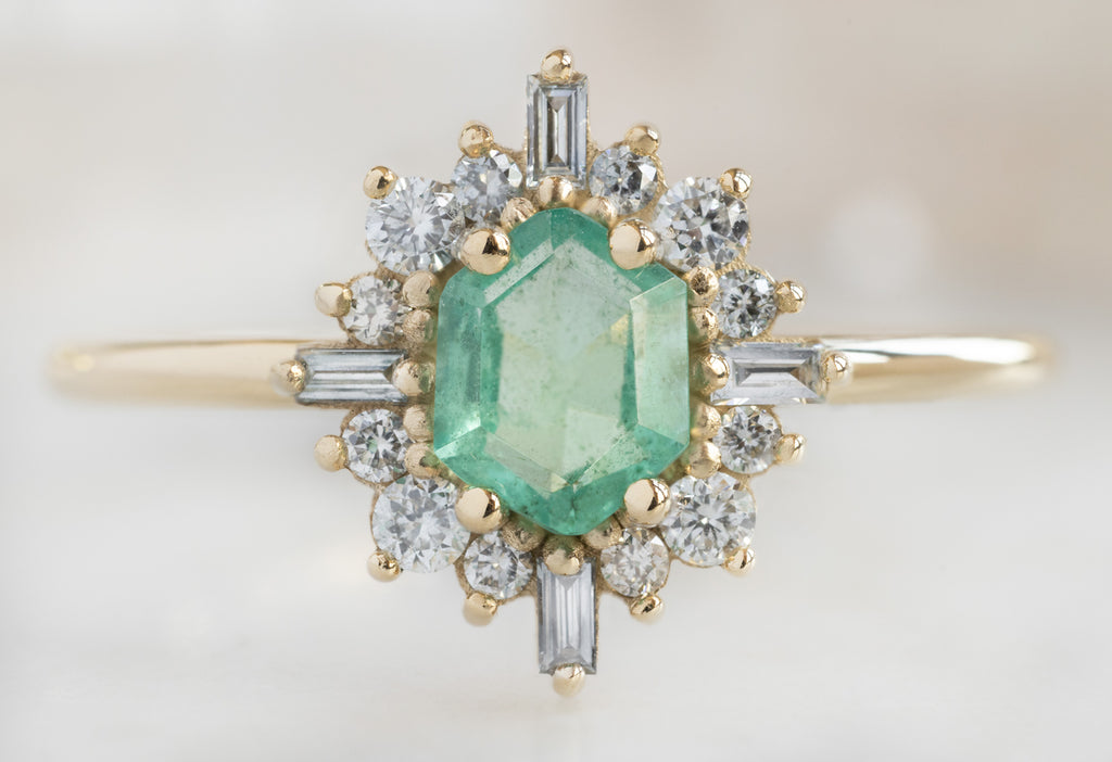 The Compass Ring with an Emerald Hexagon