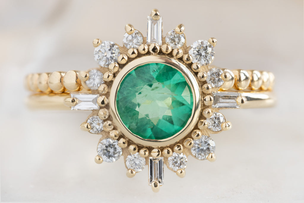 The Compass Ring with a Round-Cut Emerald with Stacking Band