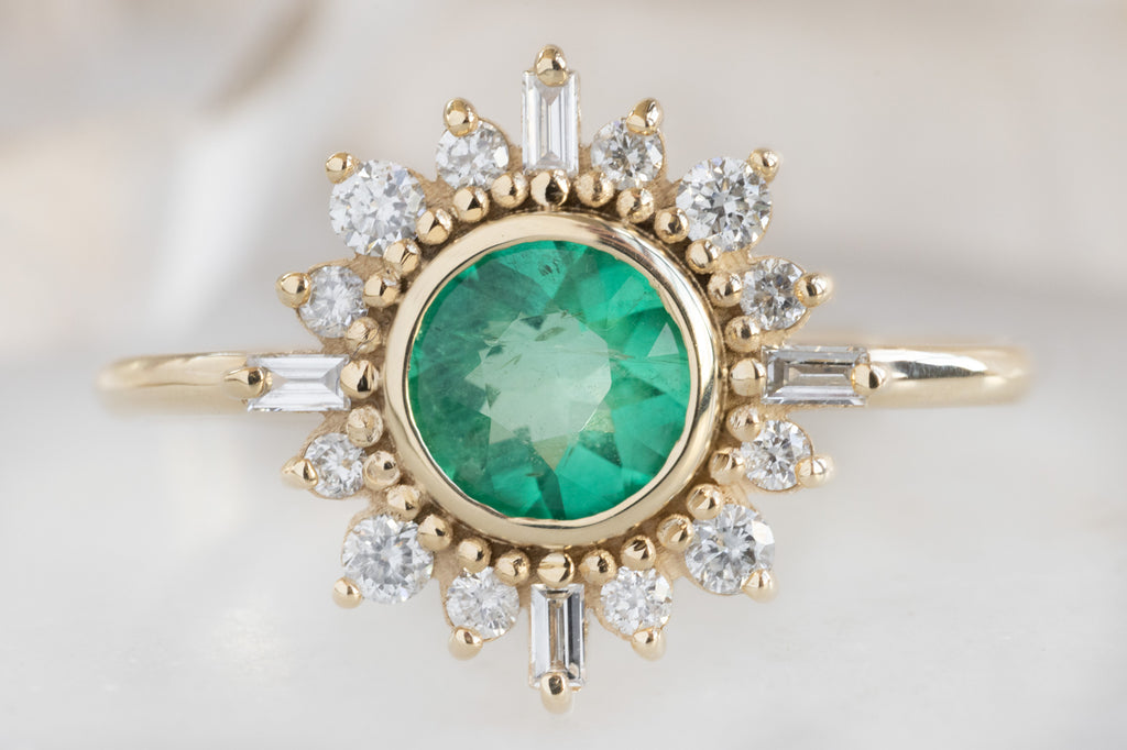 The Compass Ring with a Round-Cut Emerald