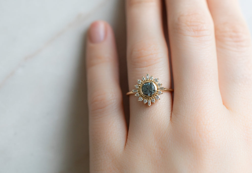 The Compass Ring with a Round-Cut Sapphire on Model