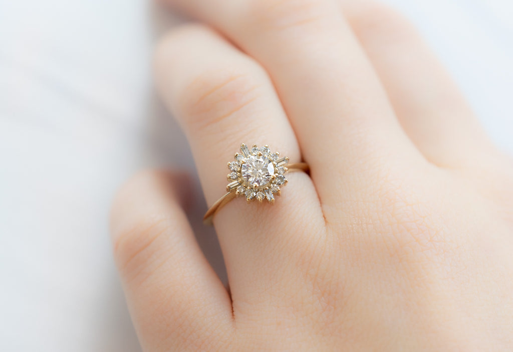 The Compass Ring with a Round-Cut White Diamond on Model