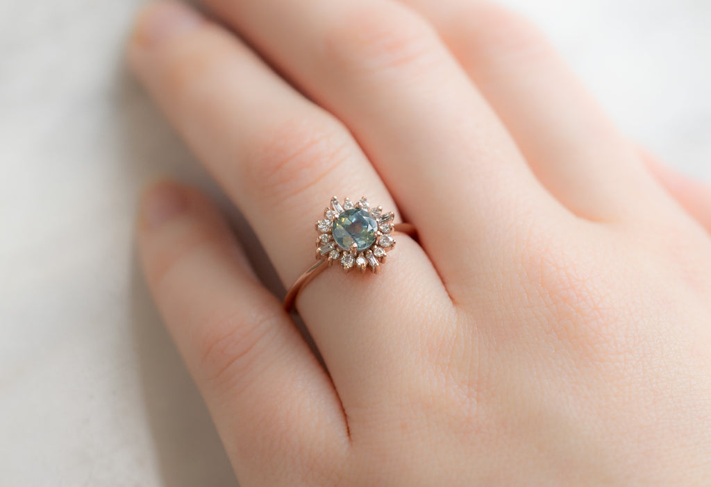 The Compass Ring with a Round Montana Sapphire on Model