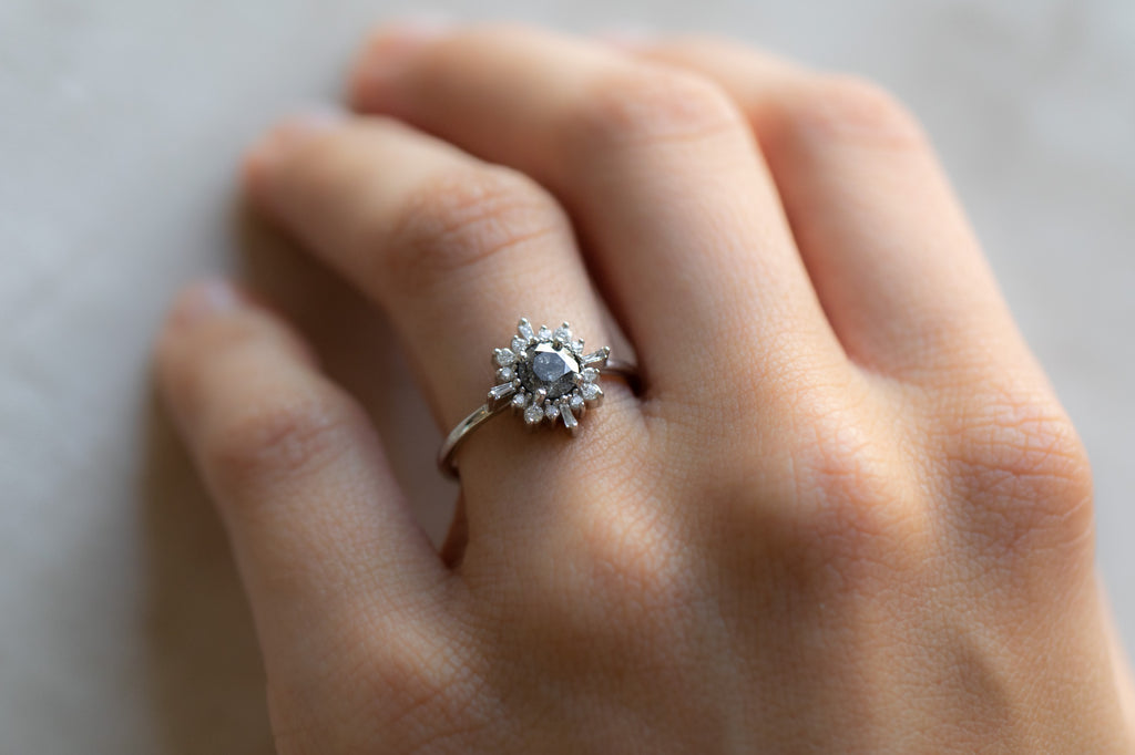 The Compass Ring with a Round Salt and Pepper Diamond on Model
