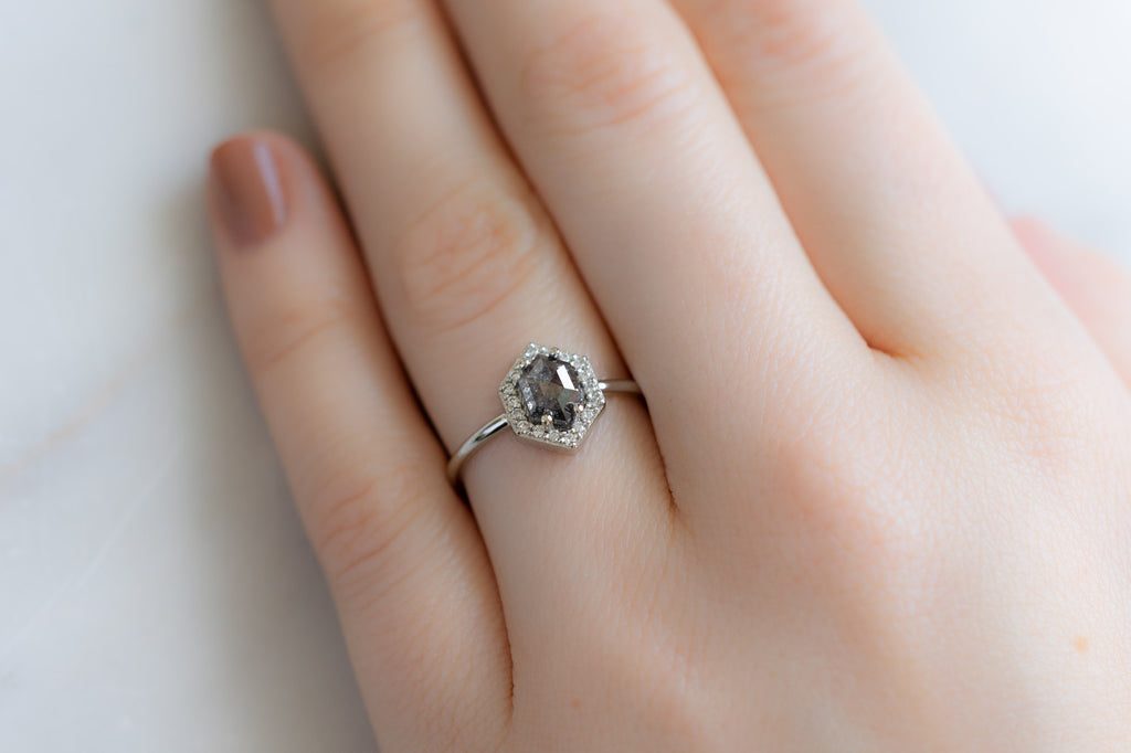 The Dahlia Ring with a Black Hexagon Diamond on Model