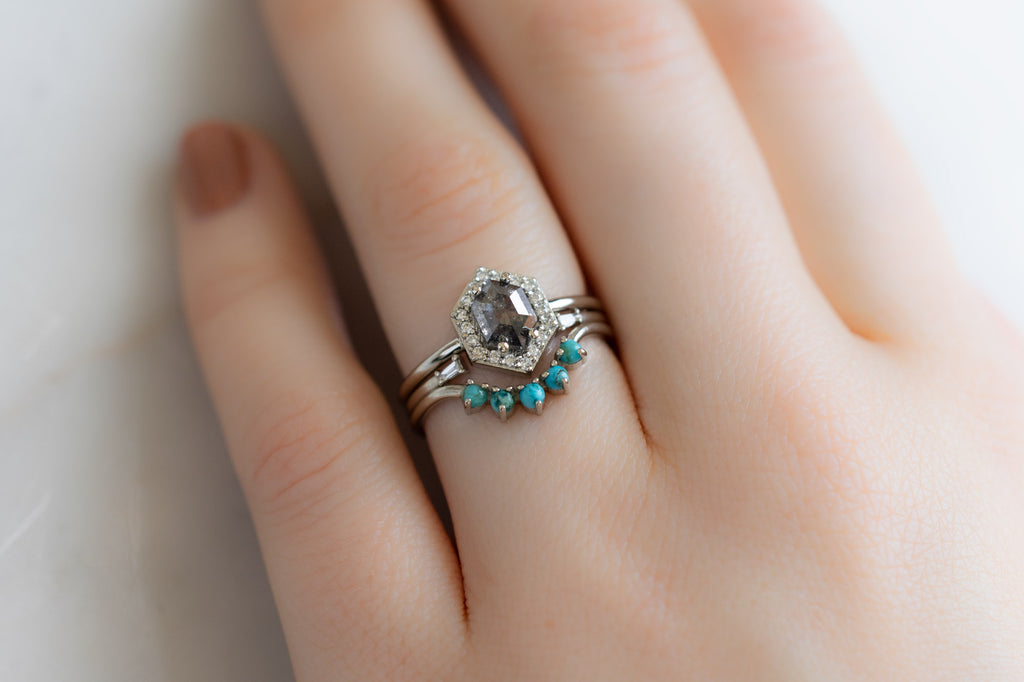 The Dahlia Ring with a Black Hexagon Diamond with Stacking Bands on Model
