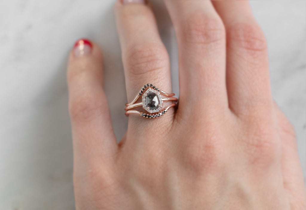 The Dahlia Ring with a Black Geometric Diamond with Stacking Bands on Model