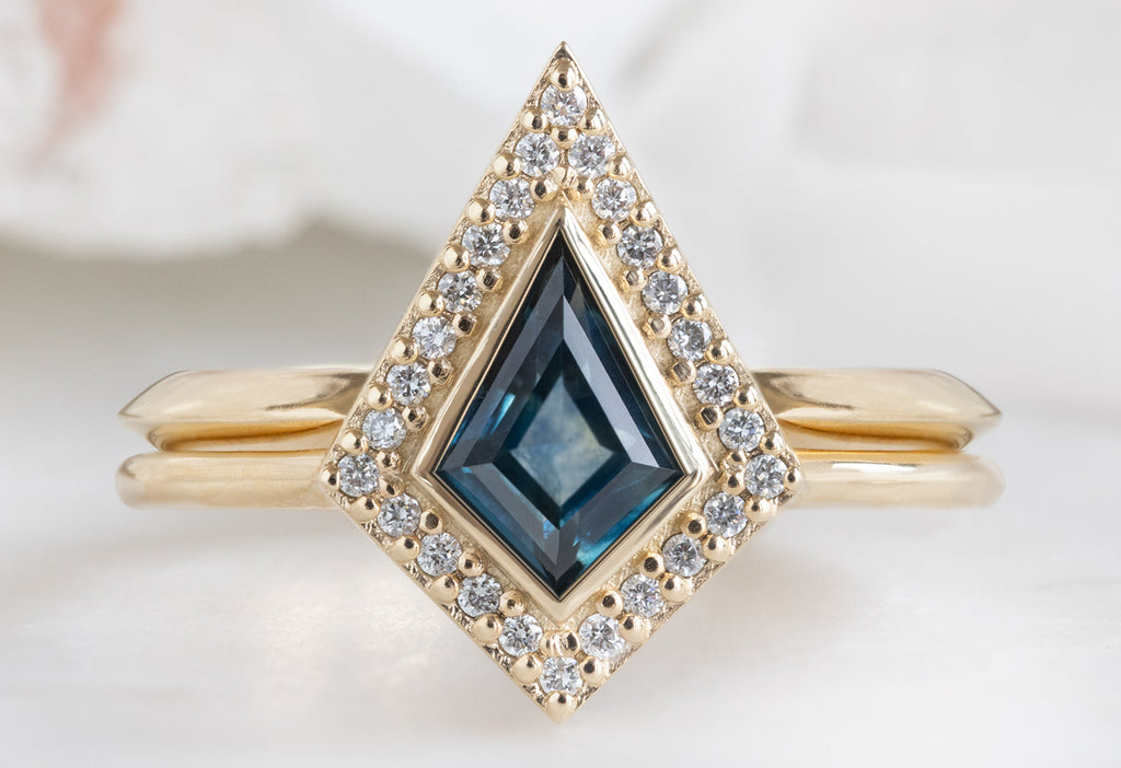 The Dahlia Ring with a Kite-Shaped Montana Sapphire with Open Cuff Knife Edge Stacking Band