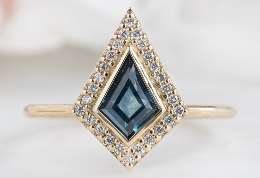 The Dahlia Ring with a Kite-Shaped Montana Sapphire