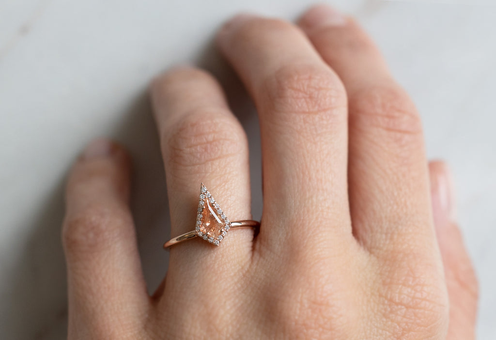 The Dahlia Ring with a Kite Shaped Sunstone on Model