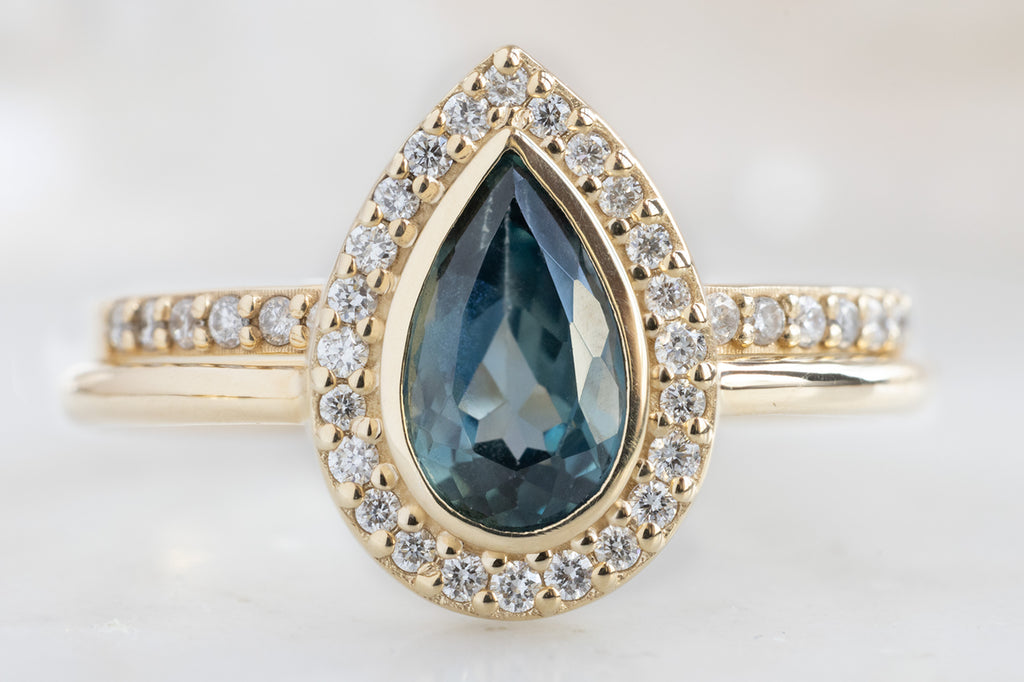 The Dahlia Ring with a Pear-Cut Sapphire with Pavé Stacking Band