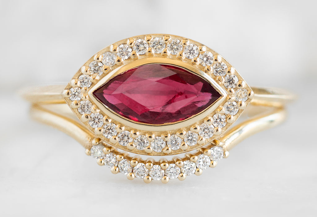 The Dahlia Ring with a Ruby Marquise with White Diamond Pavé Arc