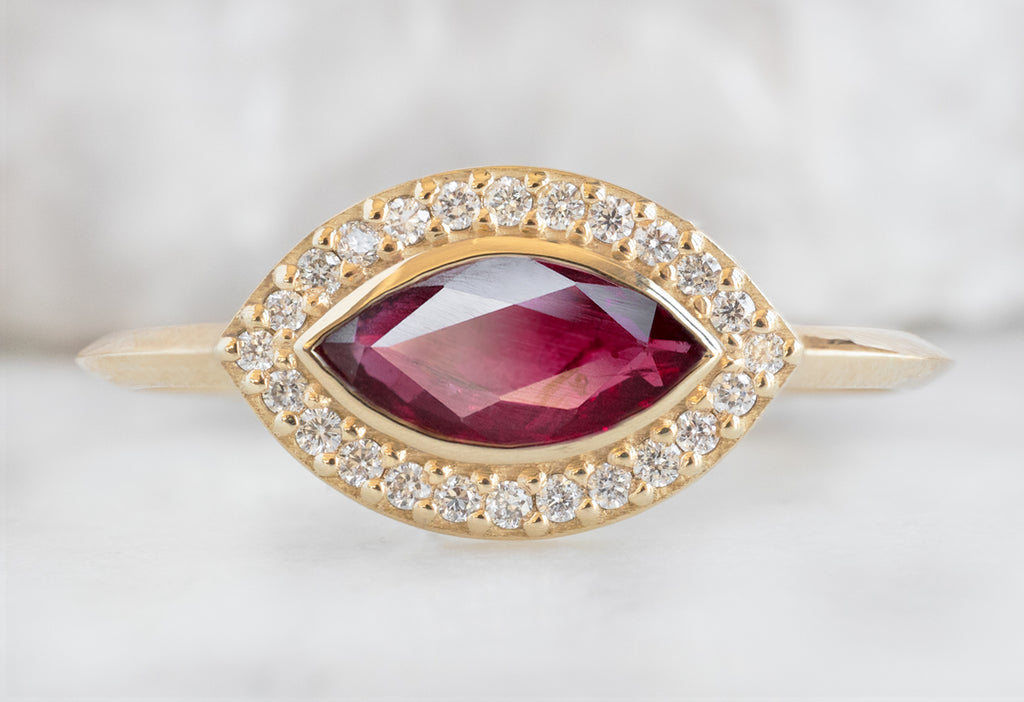 The Dahlia Ring with a Ruby Marquise