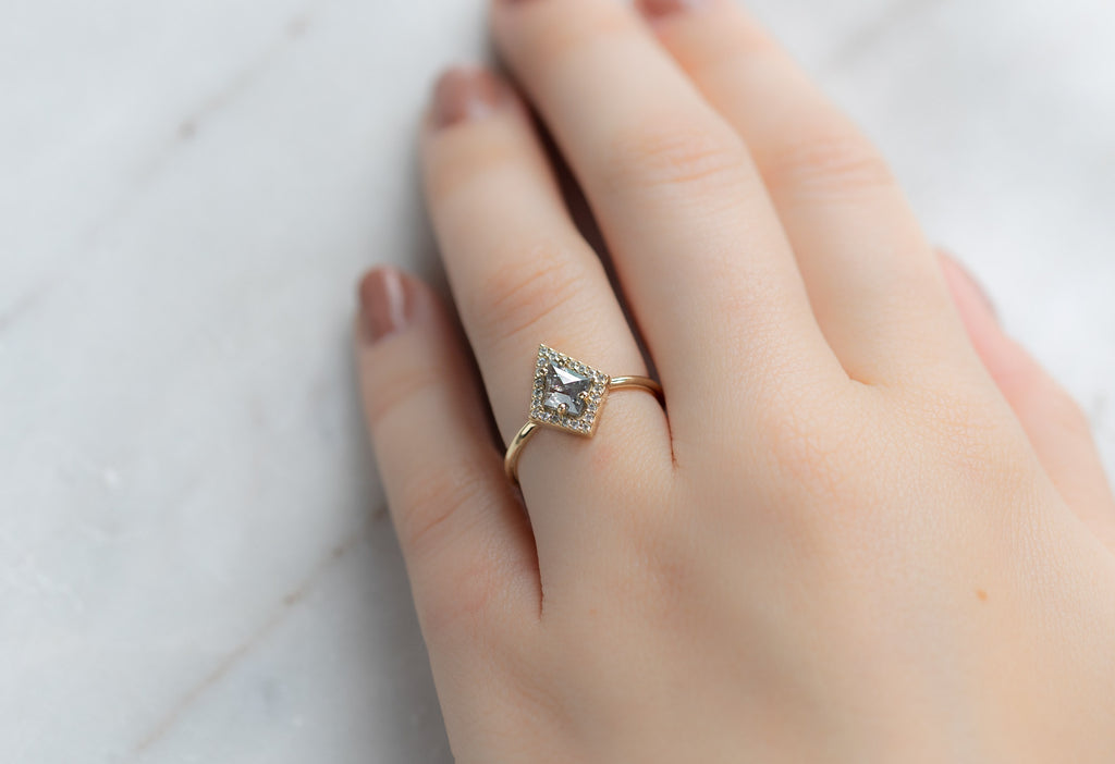 The Dahlia Ring with a Silvery Grey Kite Diamond on Model