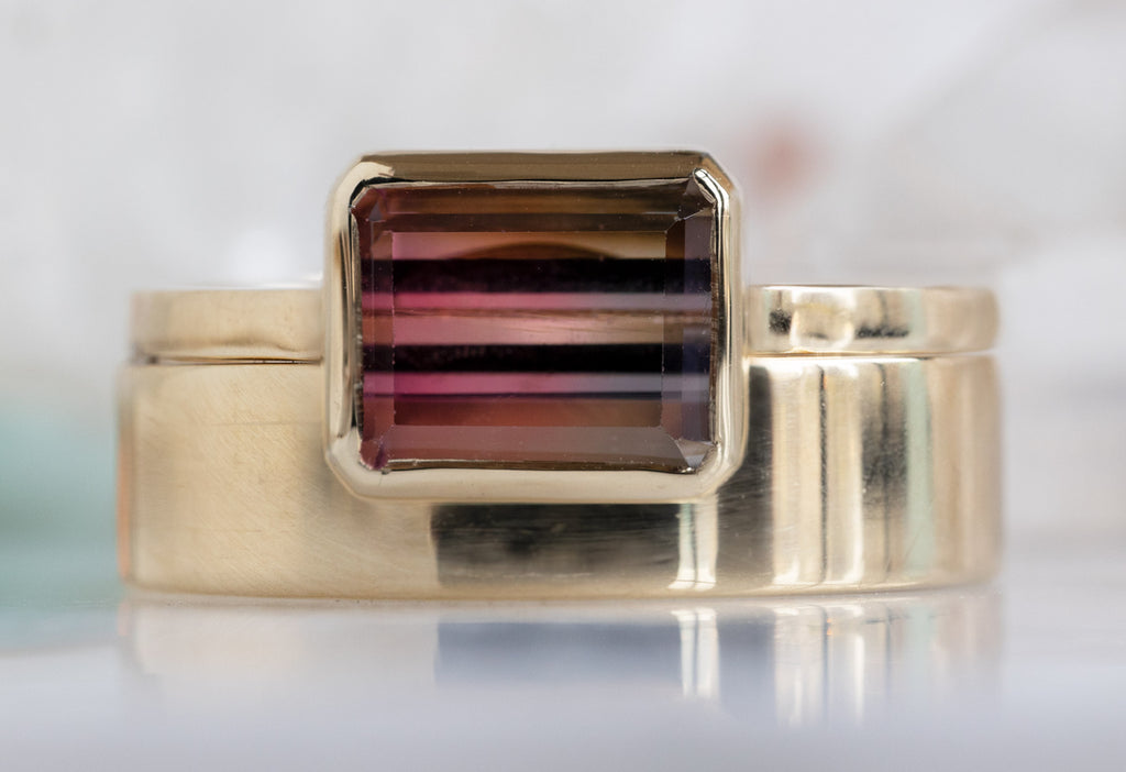 The Hazel Ring with an Emerald-Cut Bi-Color Tourmaline with Stacking Band