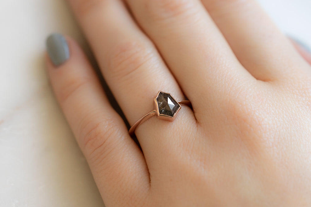 The Hazel Ring with a Black Geometric Diamond on Model