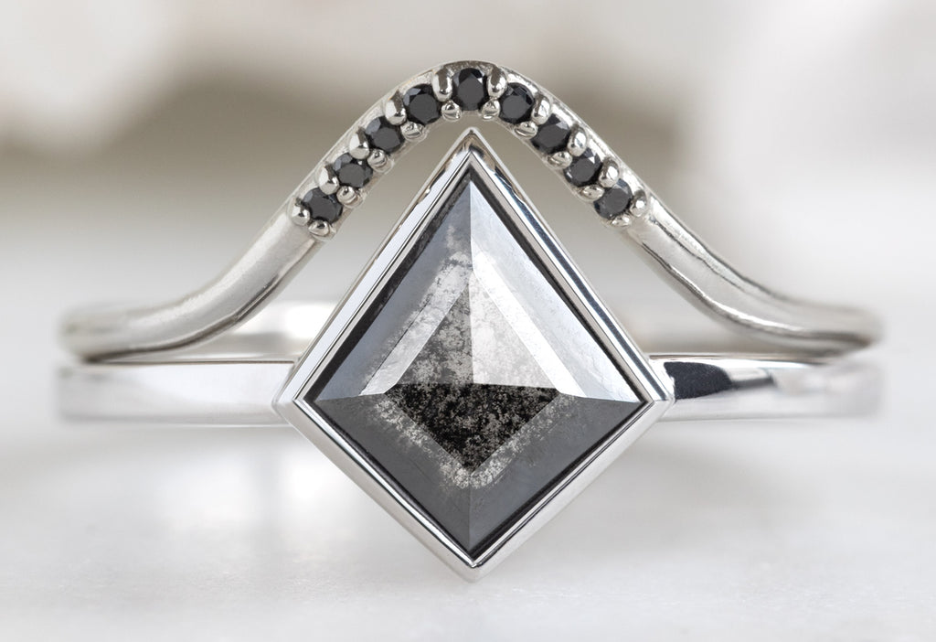 The Hazel Ring with a Black Kite Diamond with Black Pavé Peak Stacking Band