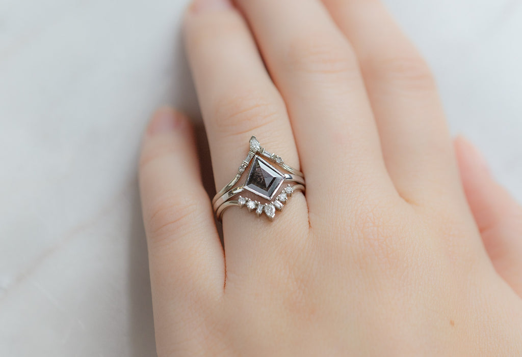 The Hazel Ring with a Black Kite Diamond with Stacking Bands on Model